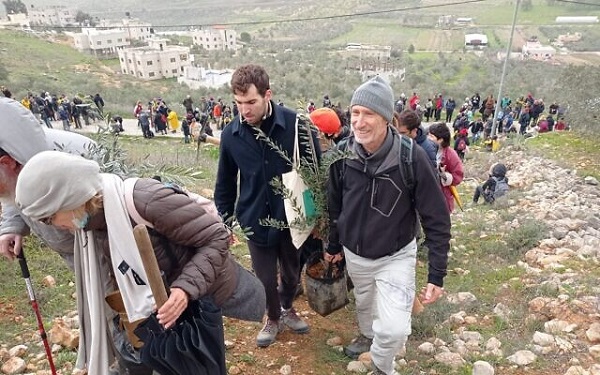 Over 400 left-wing Israeli activists gathered for tree plantation near West Bank village of Burin